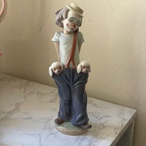 Lladro clown with puppies